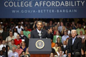 SCRANTON, PA - AUGUST 23: U.S. President Barack Obama (L speaks at an event as U.S. Vice President Joe Biden (R), looks on at Lackawanna College on August 23, 2013 in Scranton, Pennsylvania. Obama is on his second day of a bus tour of New York and Pennsylvania to discuss his plan to make college more affordable, tackle rising costs, and improve value for students and their families. (Photo by Jessica Kourkounis/Getty Images)