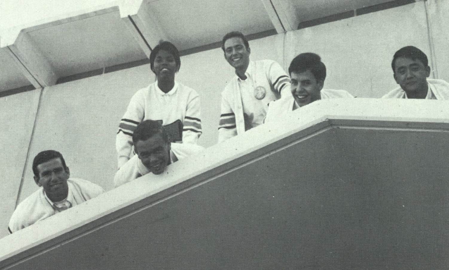 Priscilla Scotlan '68 (top row) was the first female Yell Leader at USF.  Pictured here are other Yell Leaders Pat Marantette, Tim King, Ed Chiosso, Frank Clifford, and Al Rodrigues. From the Don, 1968. From Gleeson Library's Digital Collections.   