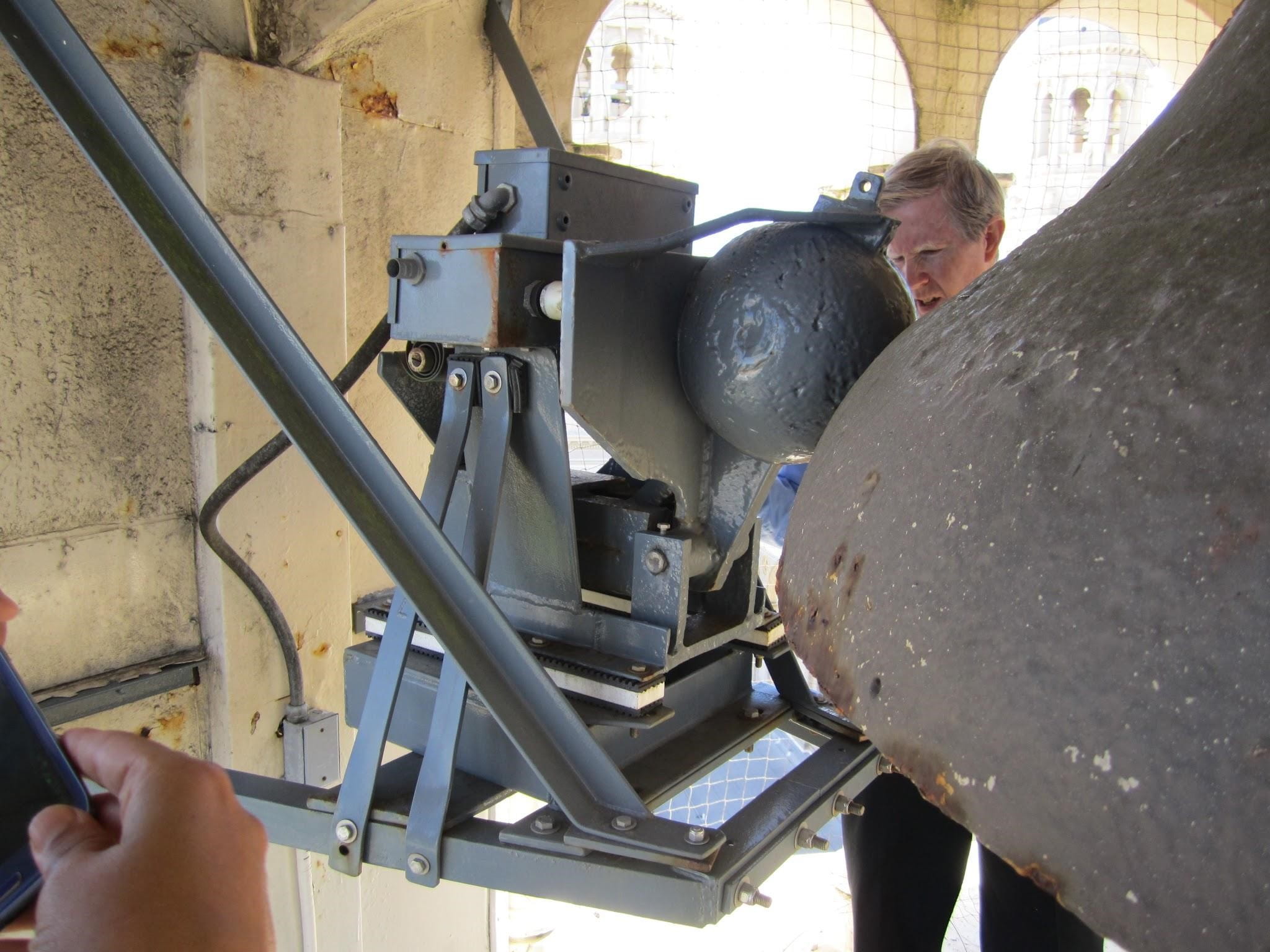 The single bell in the Northeaster tower is also rung by electric mechanism--this large clapper strikes the exterior of the bell, producing visceral vibrations. 