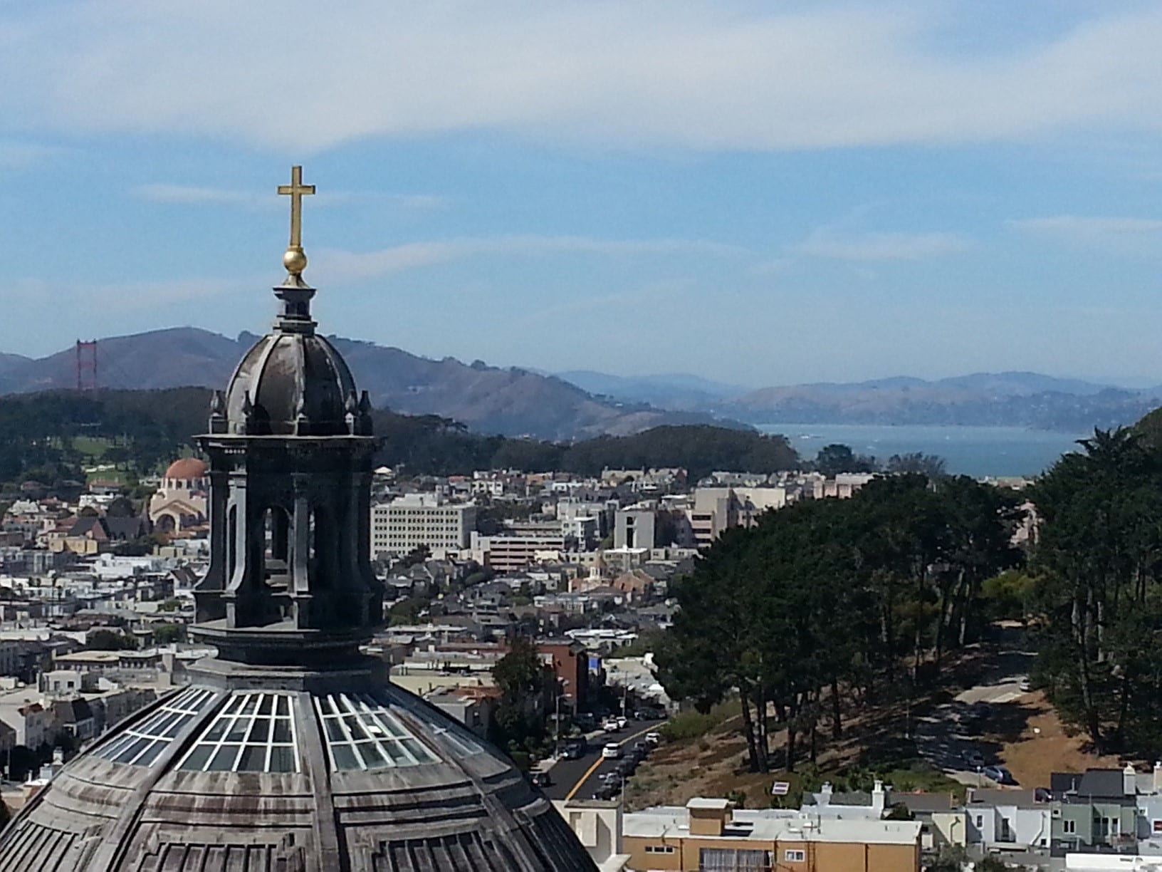 The main dome of Saint Ignatius with views of the city and Golden Gate Bridge as backdrop. Jaw Dropping!!