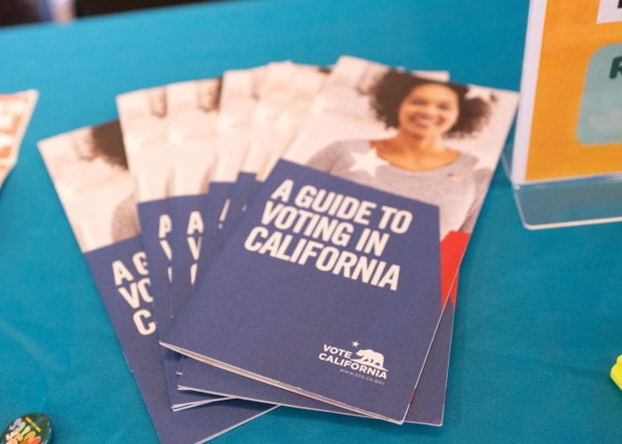 Pamphlets that offer information about voting in California