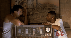 two men confront one another over a jukebox
