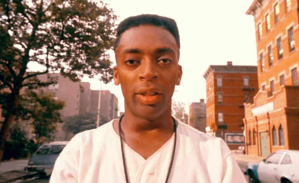 a young black man speaks directly into the camera
