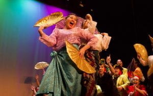 image of a Pilipino woman wearing colorful dress, dancing