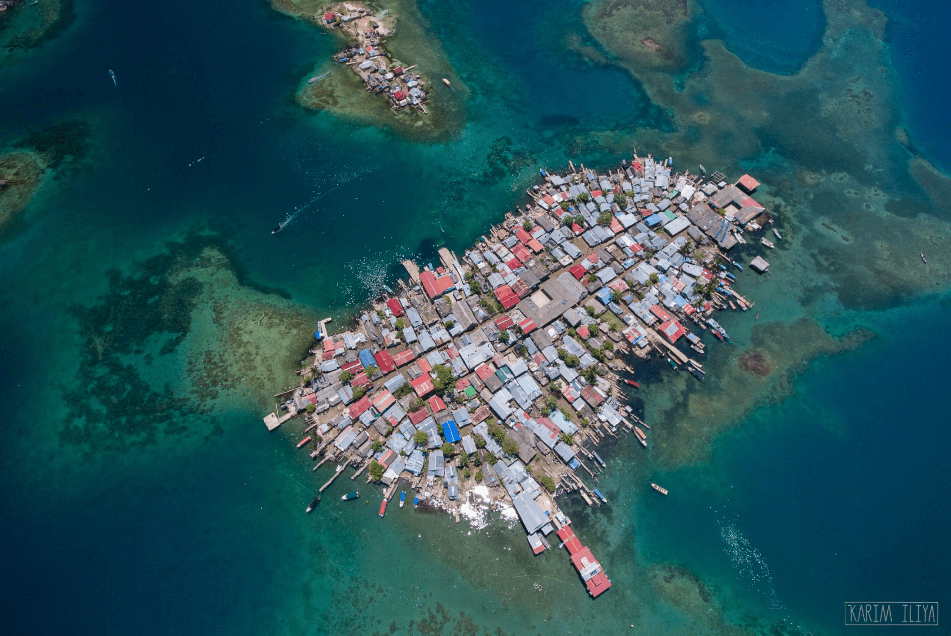 an aerial photo of a fishing village