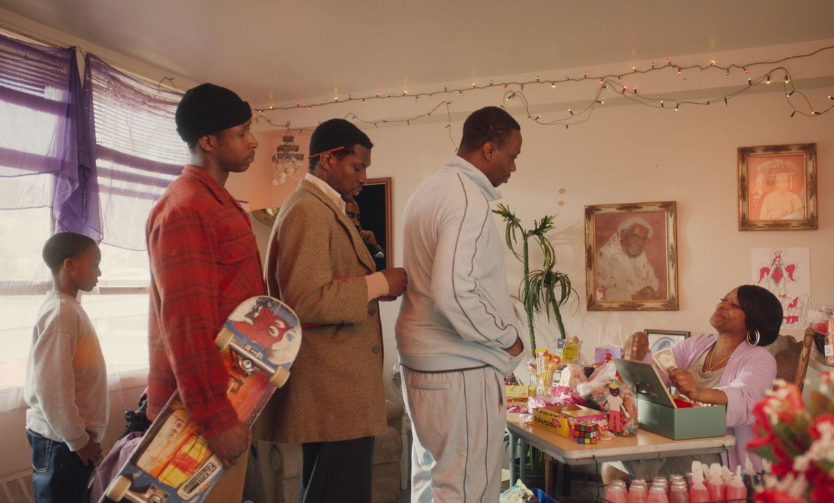 men standing in line at a candy store
