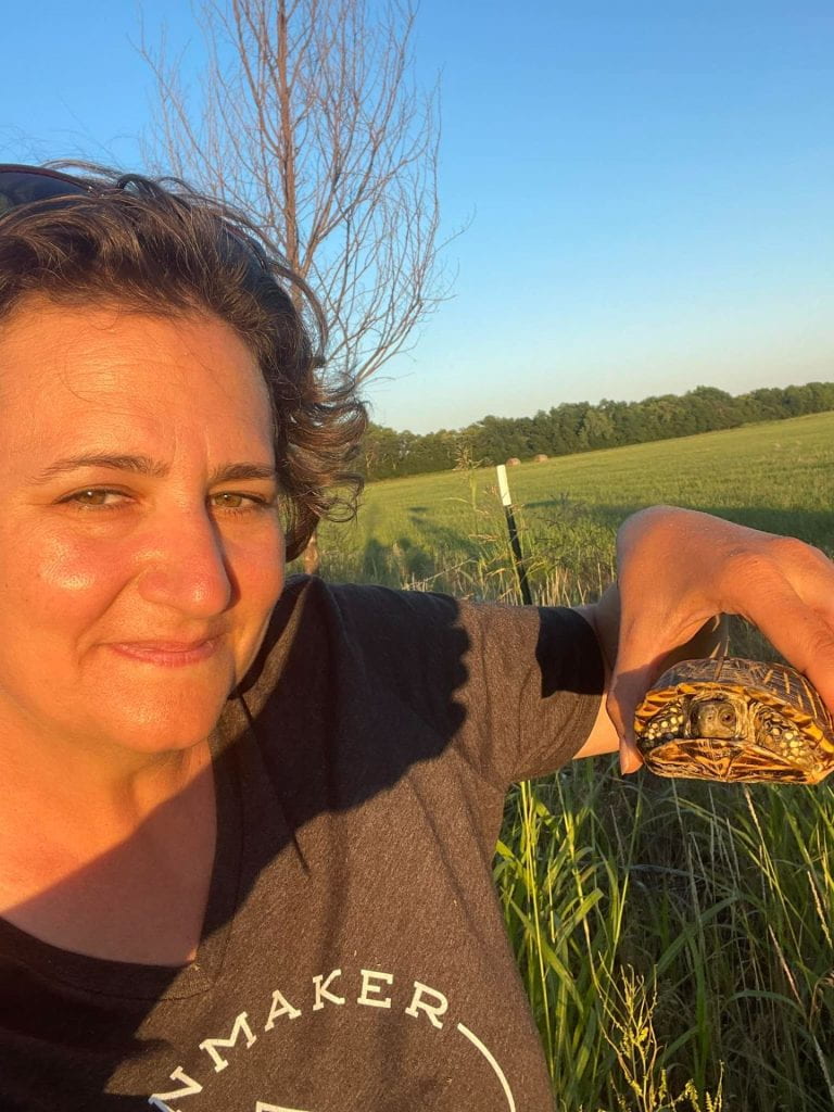 Photo of Professor, Dr. Aviva Rossi holding a turtle
