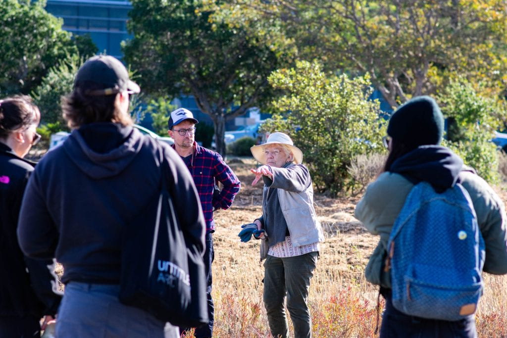 USF Watershed Management Professor, Dr. Ephke (left) and FCMCW president, Sandy Guldman (right) discussing Corte Madera Creek restoration projects with students.
