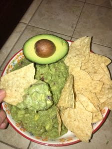 Complete guacamole and tortilla chips.