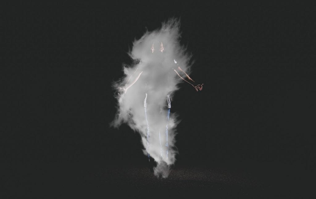 person surrounded by smoke